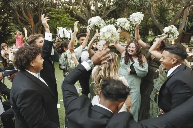 Stephanie and Lontez wedding at Botanica in Oceanside — Sun through the foliage, photograph 1