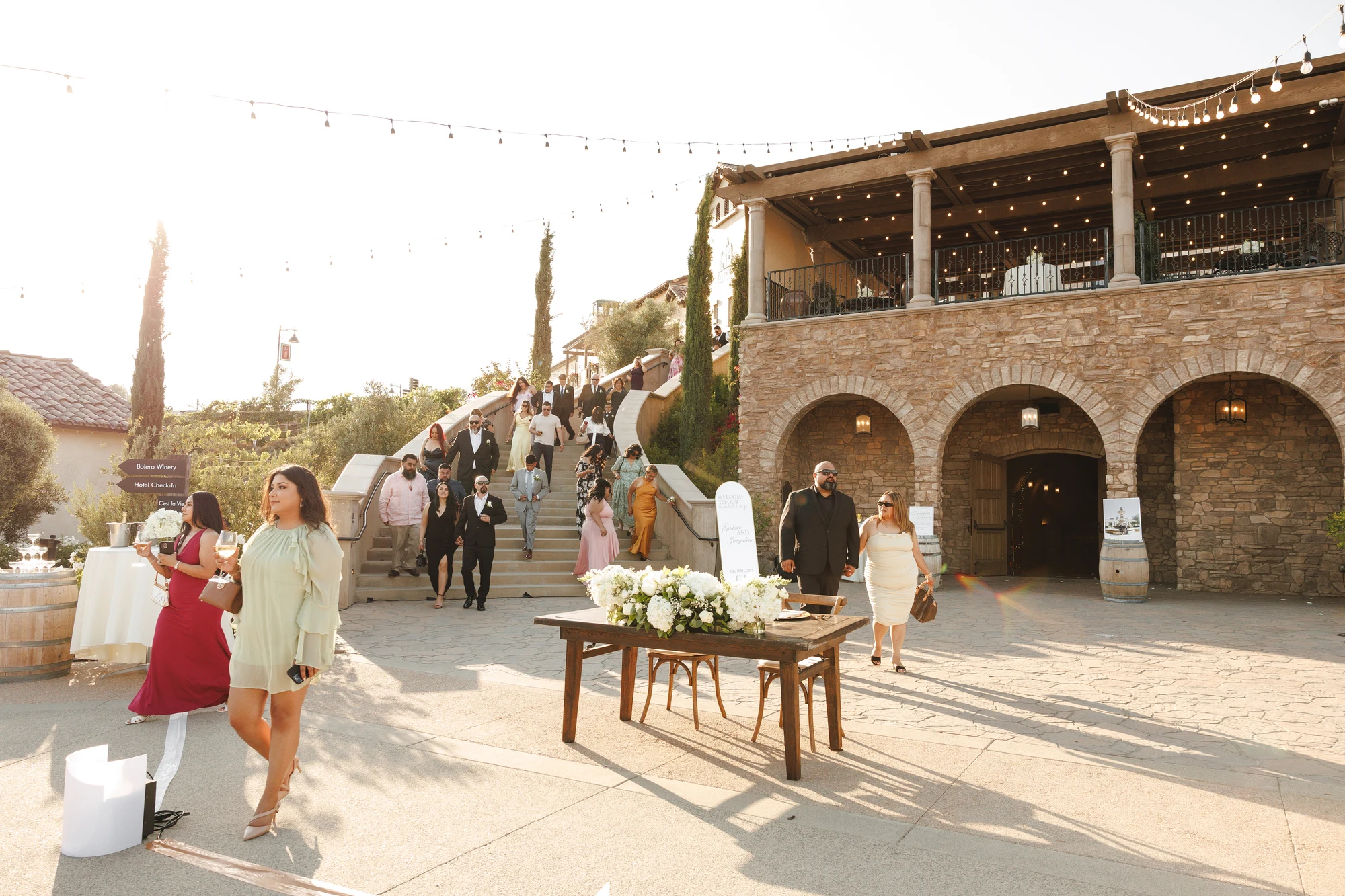 Jacqueline and Gustavo wedding at Europa Village in Temecula — Stone, vines & soft remaining light, photograph 2