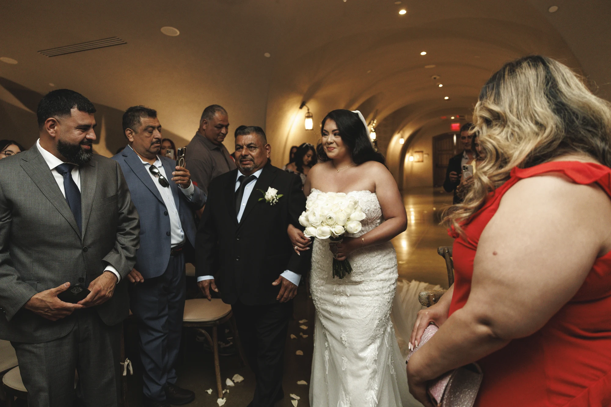 Jacqueline and Gustavo wedding at Europa Village in Temecula — A wine cellar, in natural light, photograph 1