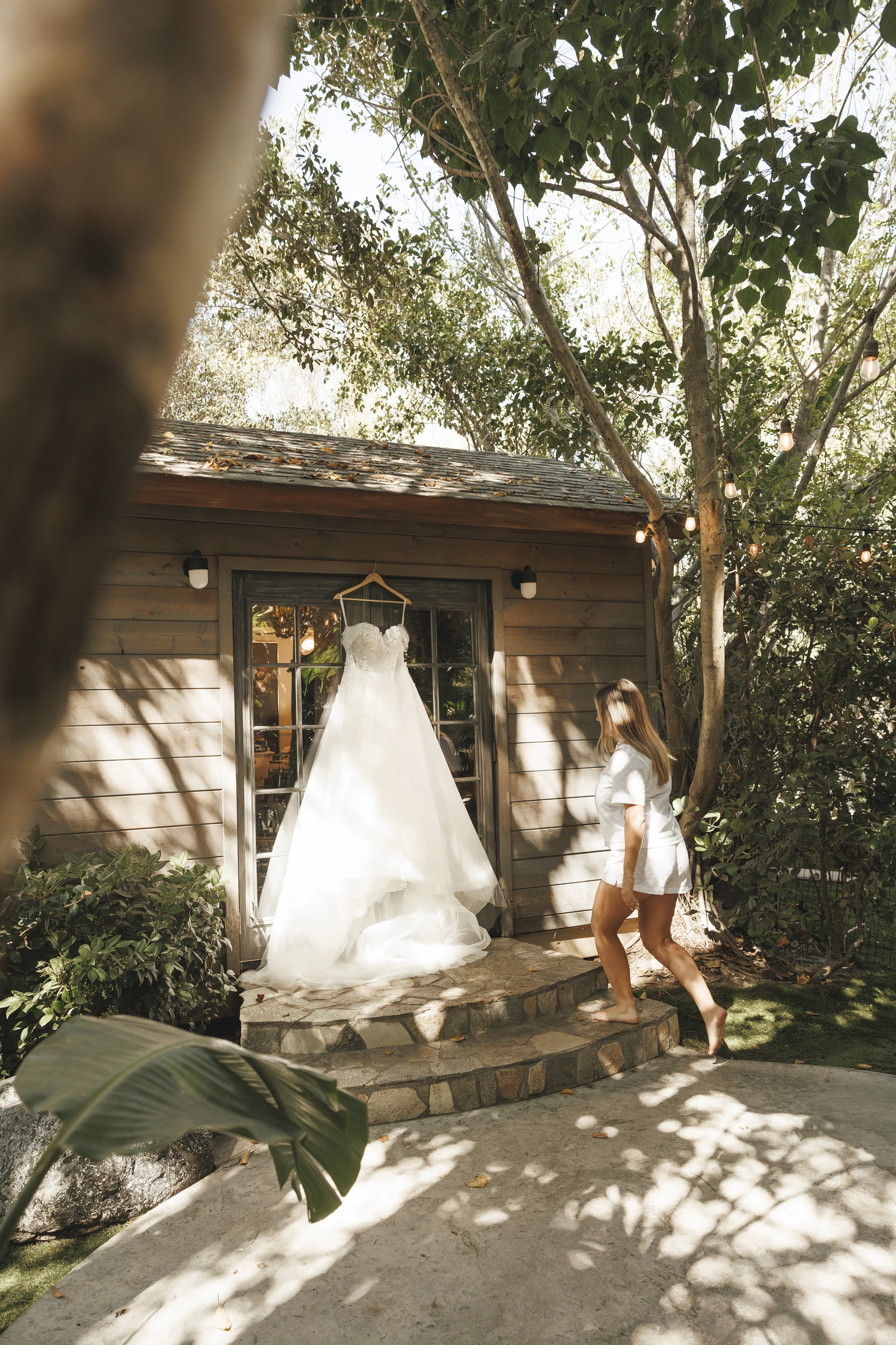 Stephanie and Lontez wedding at Botanica in Oceanside — A flat lay on a garden stone, photograph 2
