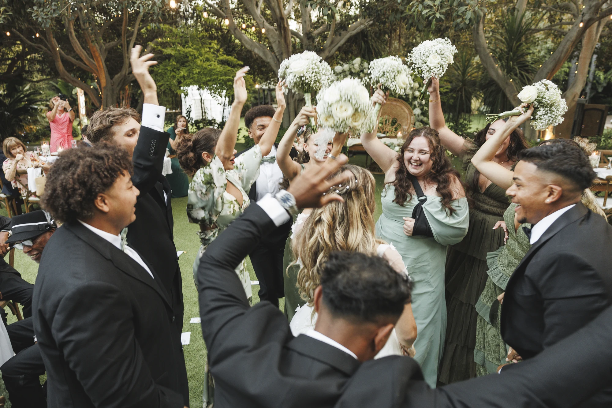 Stephanie and Lontez wedding at Botanica in Oceanside — Sun through the foliage, photograph 1