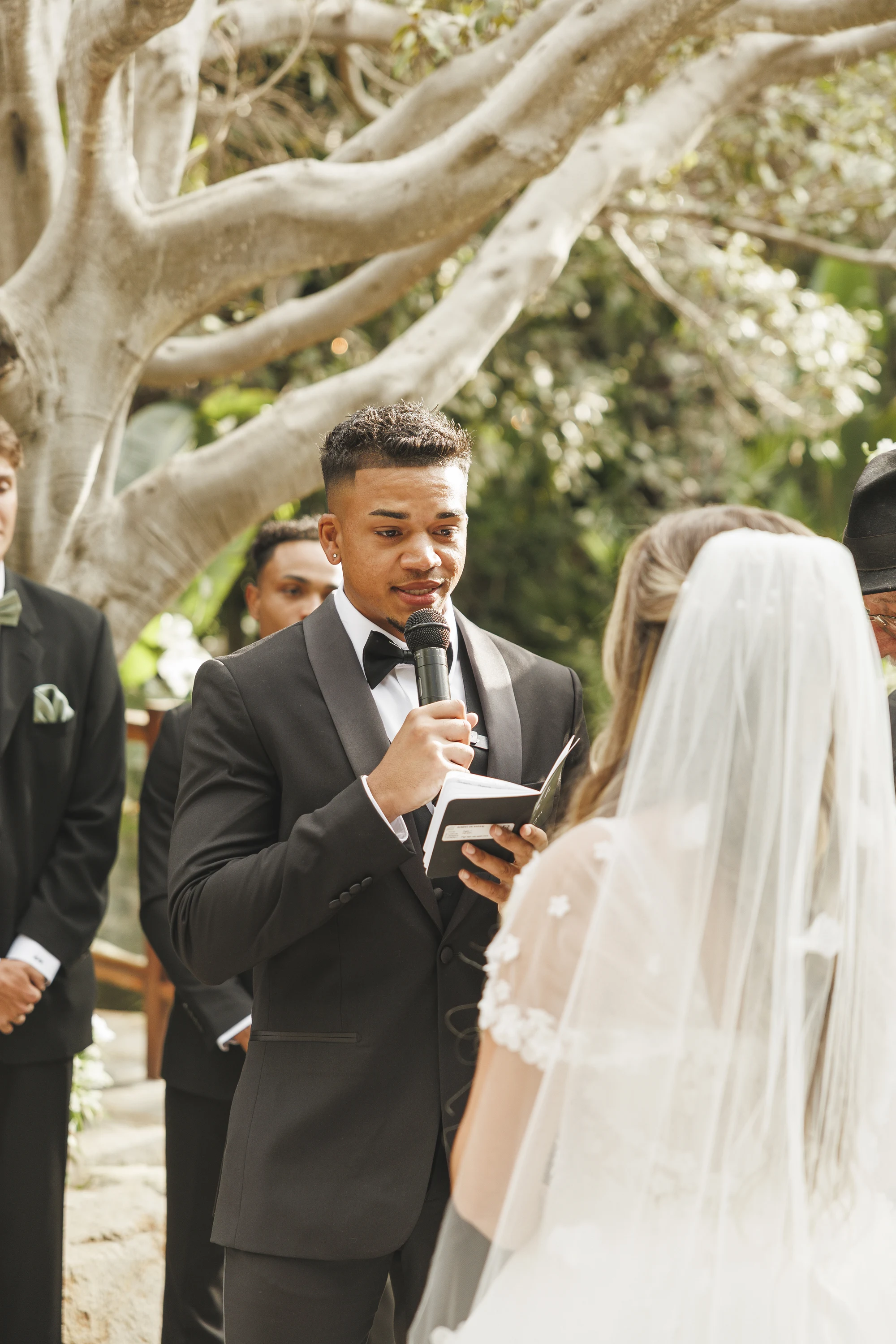 Stephanie and Lontez wedding at Botanica in Oceanside — Framed by doors, water & greenery, photograph 1