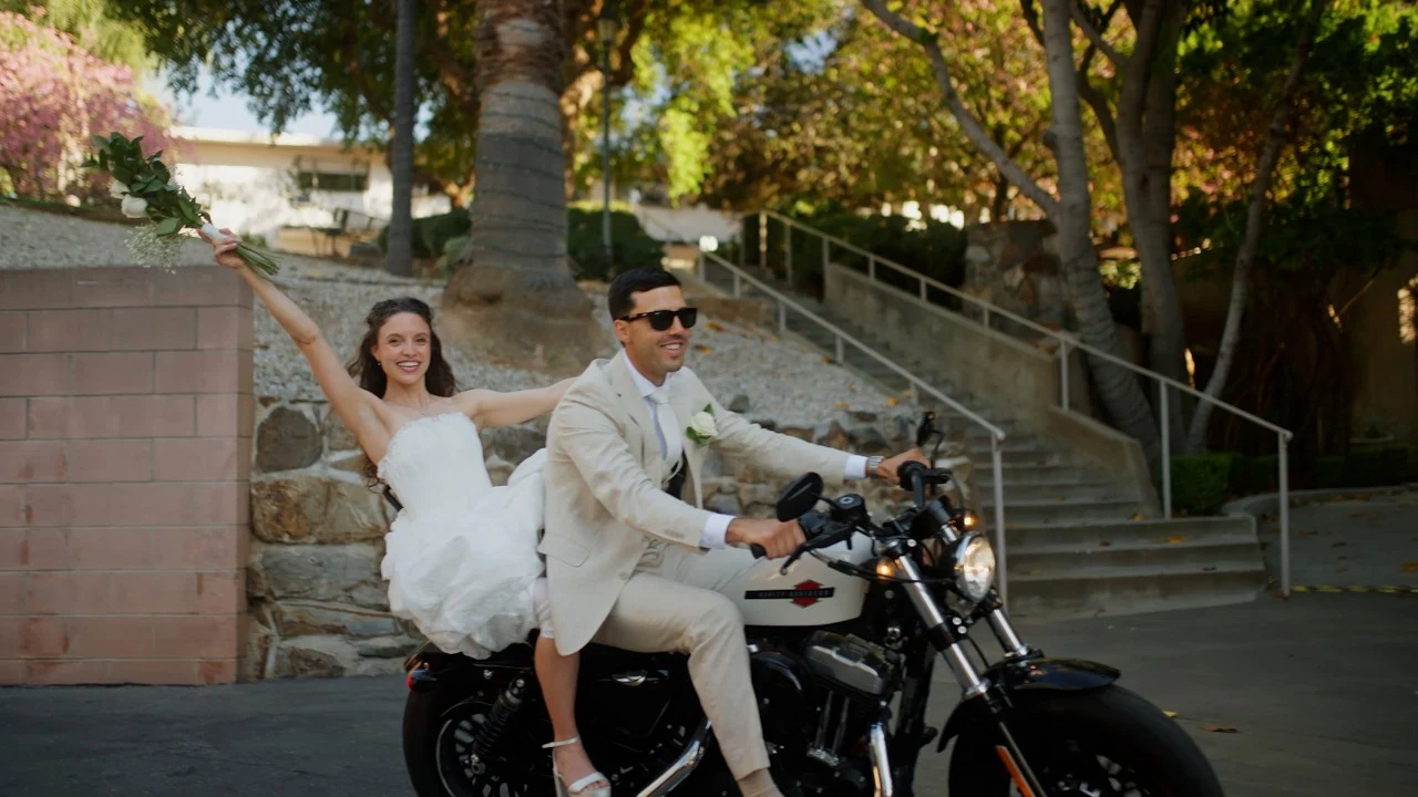 Fidelia and George in a Super 8 wedding film moment