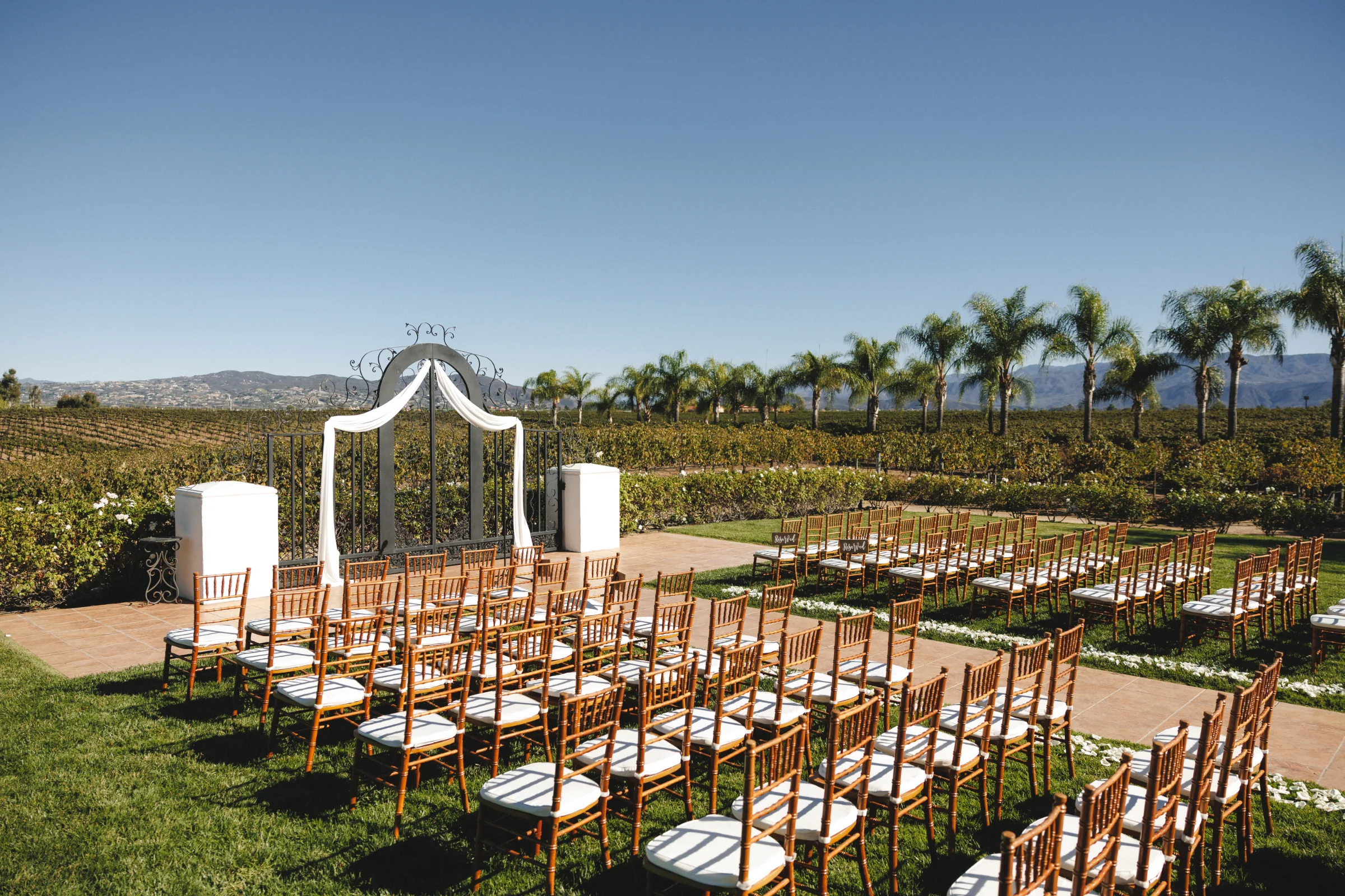 Outdoor wedding ceremony setup overlooking the Temecula hills at Villa de Amore